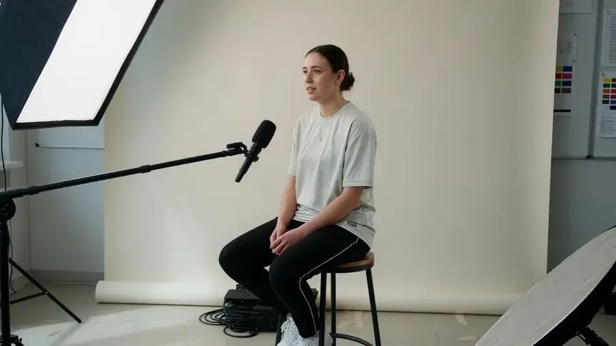 Calm player interview setting with soft window light