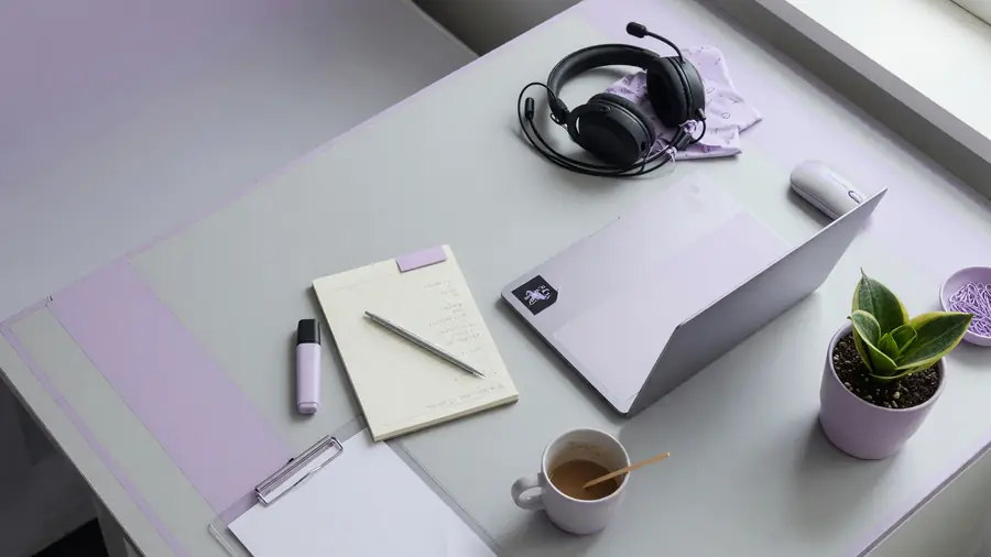 Support desk with ticket notes and headset